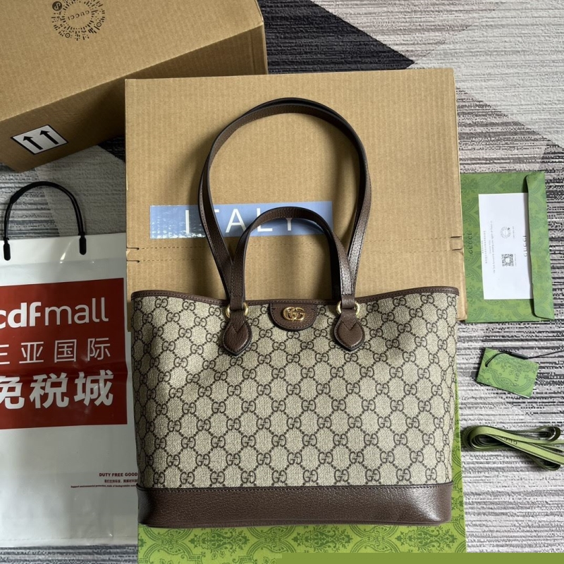 G*u*i shopping bags